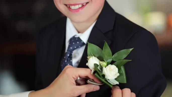 Pinning a Boutonniere