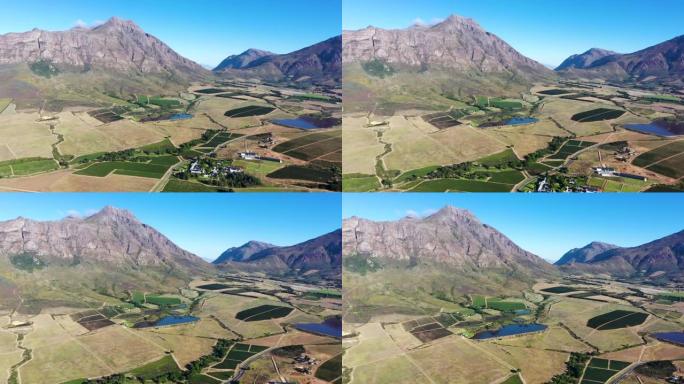 南非西开普省风景如画的葡萄酒庄园上的葡萄园上空飞行的4k美丽的空中风景