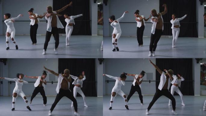 多民族健身男女现代舞者练习舞蹈套路