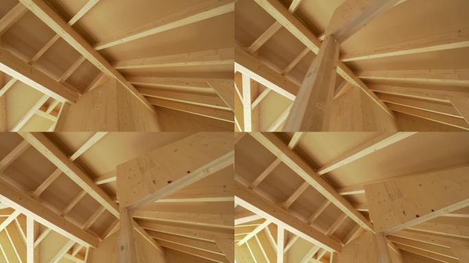 现代交叉层压木材房屋天花板横梁的美丽景色。