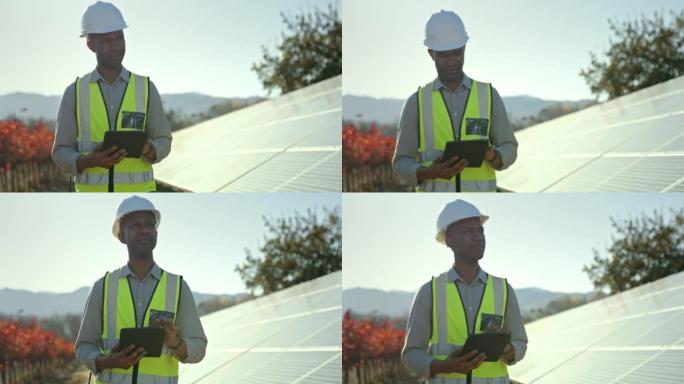 太阳能电池板，可再生能源农场和带平板电脑的工程师进行维护检查。黑人在太阳能发电厂上行走，采用数字技术