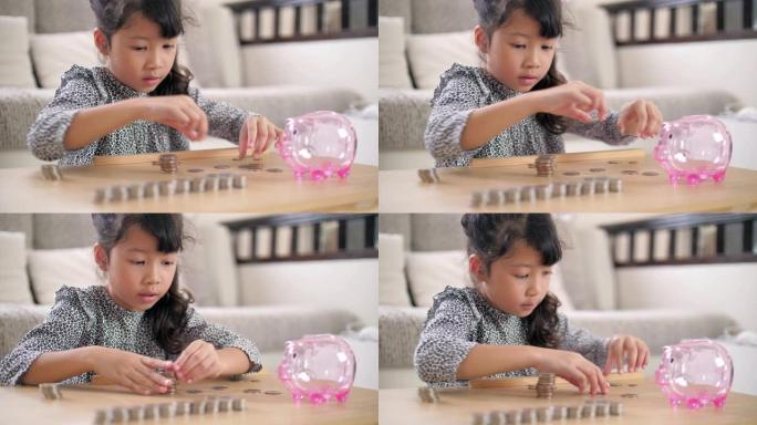 小女孩数着硬币为未来存钱