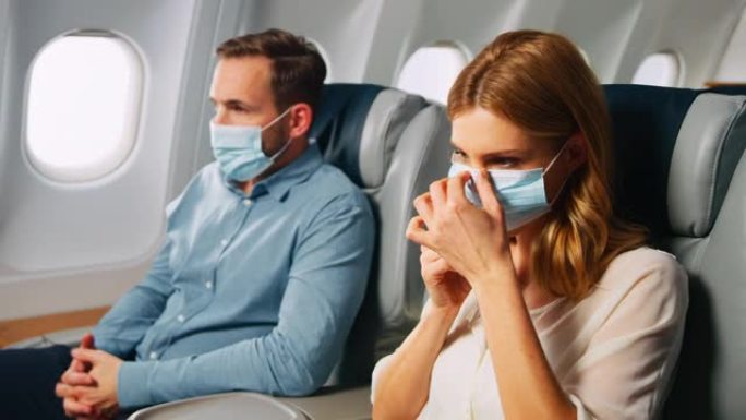 飞机防护面罩外国人坐飞机疫情防护实拍素材
