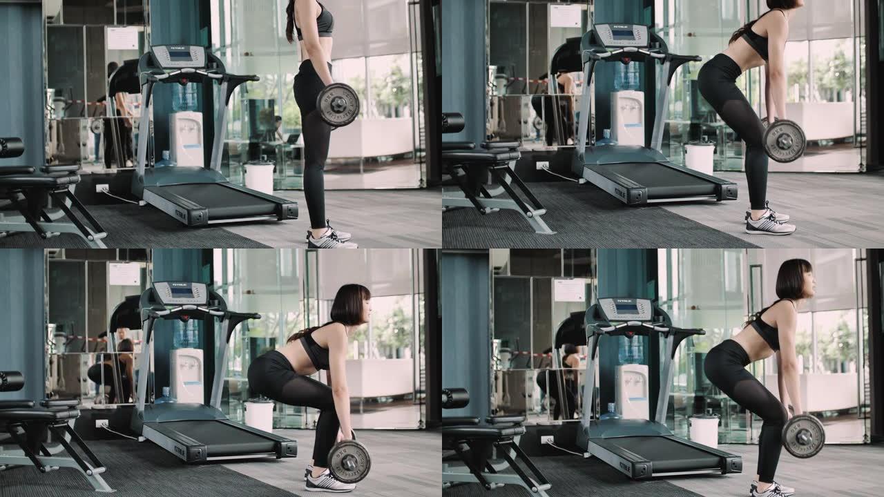女人在健身房锻炼硬拉杠铃树型