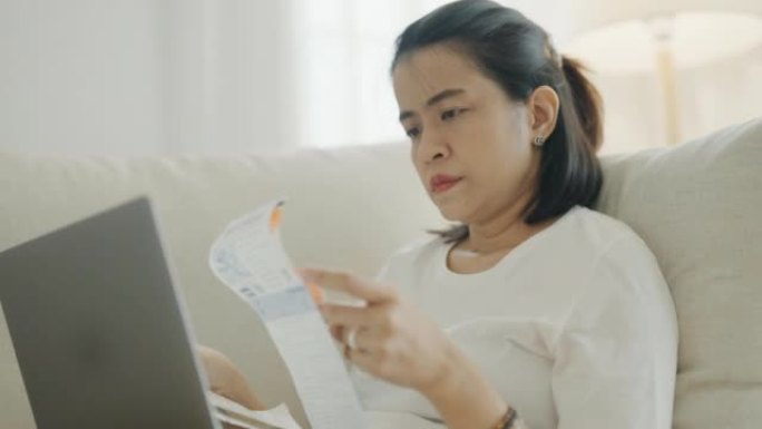 亚洲女性在家管理费用账户。