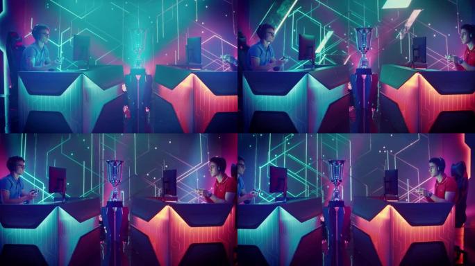 两名具有竞争力的专业电子竞技游戏玩家在锦标赛上使用控制器玩控制台视频游戏，玩家庆祝胜利。网络游戏锦标