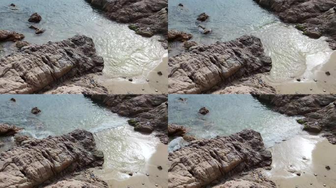 海边的礁石和海浪，60帧实时视频