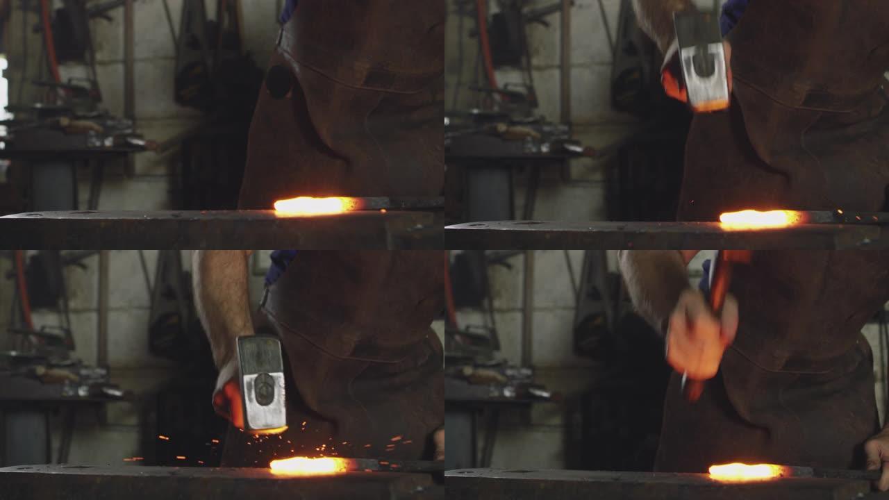 男性铁匠在铁砧上锤击红色热金属制品的特写