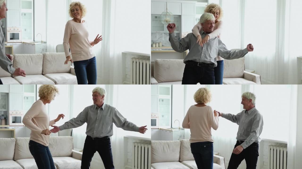 活泼的老年配偶在客厅里一起跳舞