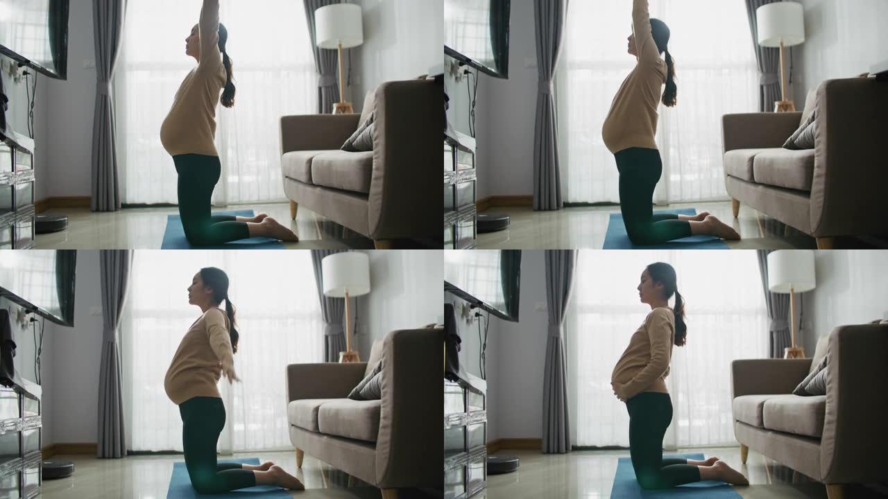 亚洲孕妇在家锻炼居家热身待产