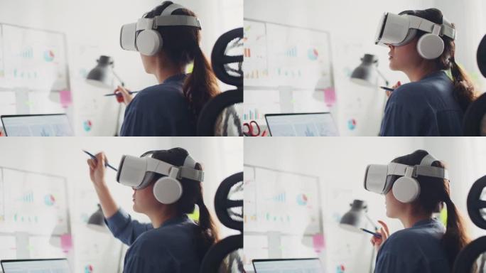 Metaverse: 戴着VR眼镜的亚洲妇女在办公室工作