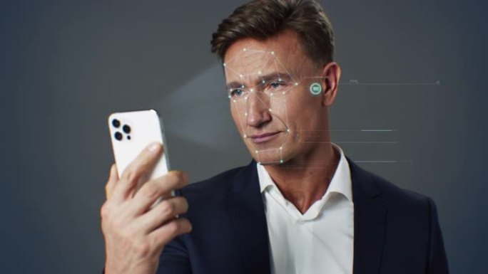 人脸id检测。生物特征面部识别安全系统3d扫描使用具有现代技术人员身份的智能手机对商人进行身份验证。
