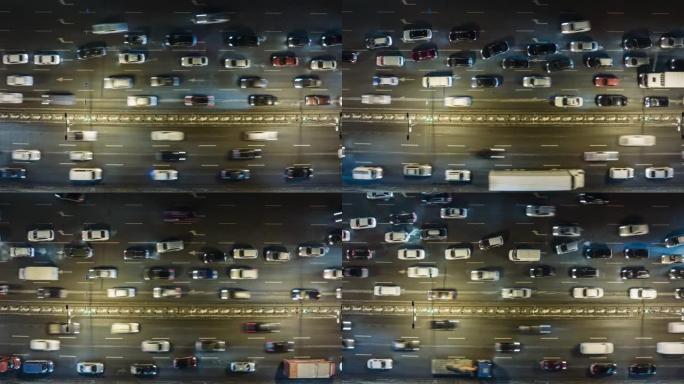 高峰时间交通堵塞。道路上许多汽车的俯视图。时间流逝