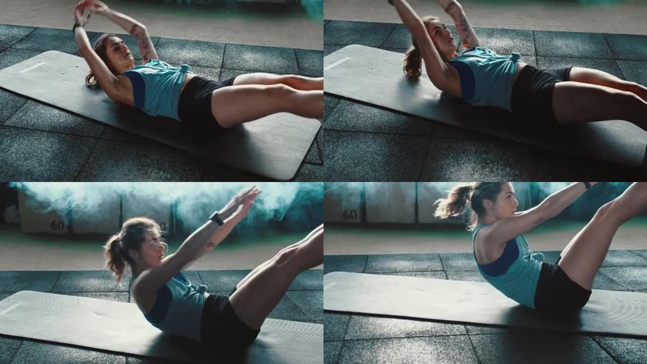 迷人的运动坚定的年轻白人女性在大气光健身房的瑜伽垫上进行剧烈的腹肌锻炼。