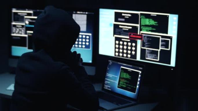黑客在计算机上工作，运行代码脚本批处理