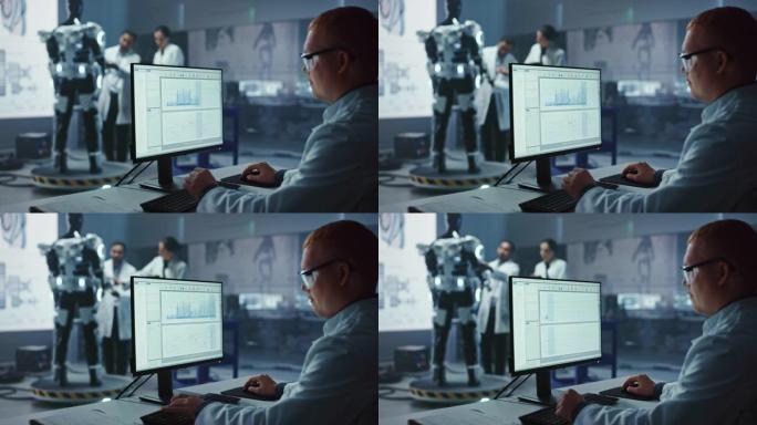 在机器人开发实验室: 首席分析师使用计算机，女工程师，顶尖的男性科学家从事仿生学外骨骼原型的工作。设