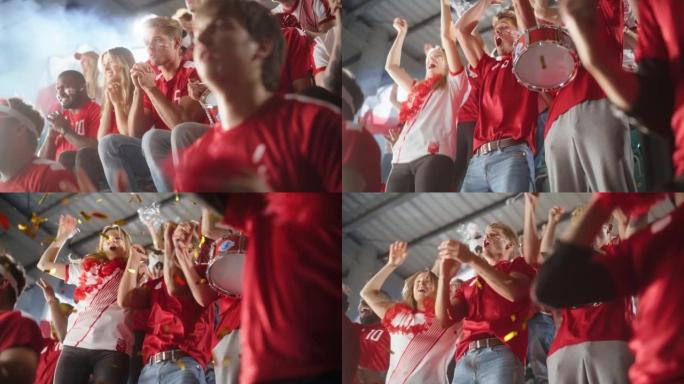 体育场馆活动: 英俊的高加索人欢呼。满脸彩绘的球迷大喊他们的红色足球队获胜。进球庆祝，冠军获胜。低角