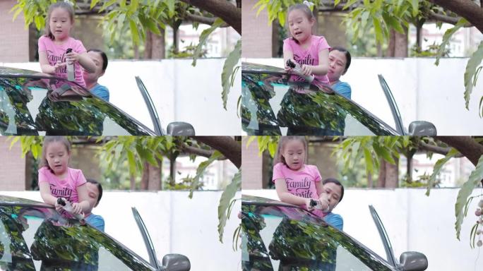 女孩帮妈妈洗车干活母女假期