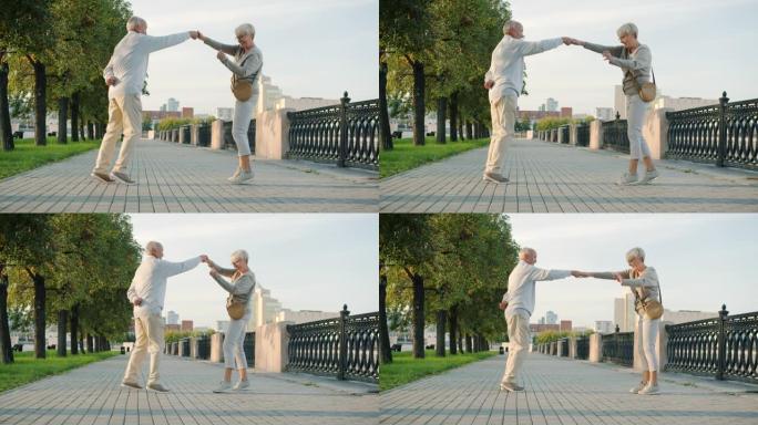 快乐的老年夫妇在外面跳舞，在河堤里玩乐，享受城市的夏日早晨