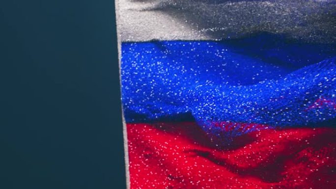俄罗斯国旗背景。俄罗斯联邦国旗飞成小颗粒