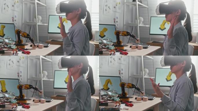 工程师戴着VR眼镜控制机器人手臂
