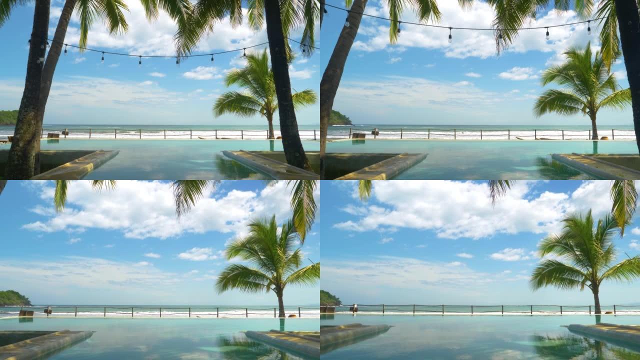 慢动作: 热带度假胜地无边泳池的海滨景观