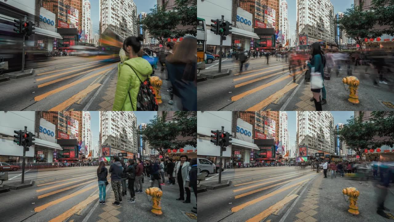 时间流逝的游客人群在香港步行，等待交通信号灯的人使用人行横道。