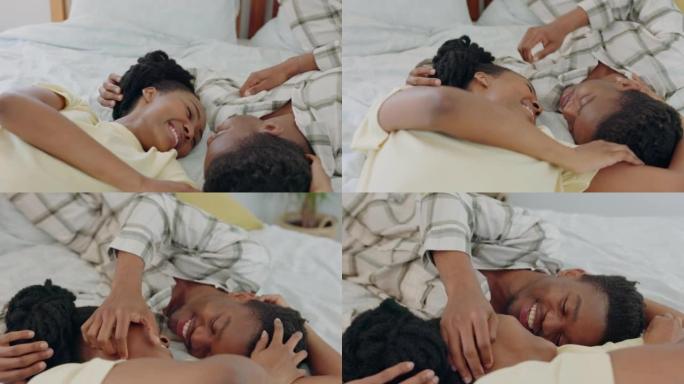黑人夫妇，爱与交流，在一起的触摸和快乐，在家里的卧室里交谈和联系。黑人妇女，躺在床上的黑人男子，关心