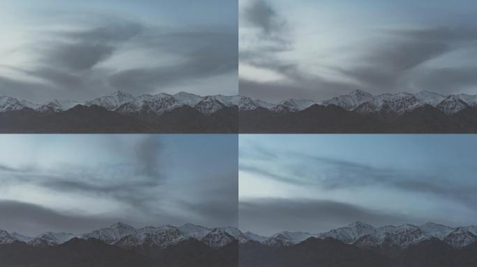 T/L子云在黄昏的雪山上滚动