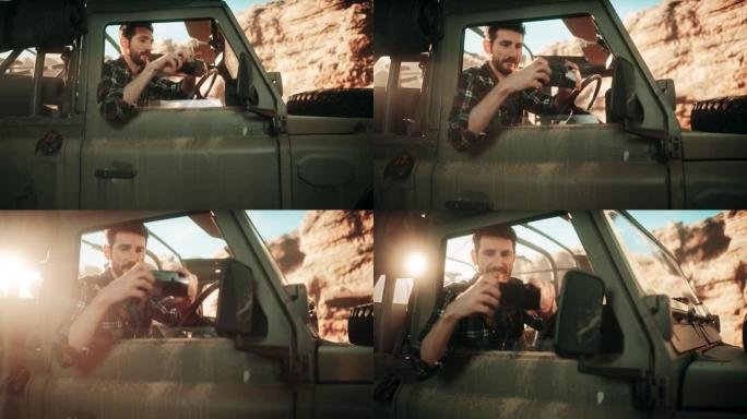 沙漠之旅: 男性探险家的肖像使用智能手机在越野SUV穿越岩石峡谷时拍照。带有奇妙性质的社交媒体帖子的