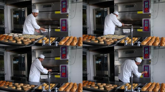拉丁美洲男子安排新鲜的面包和糕点，并将其放入面包店的烤箱中