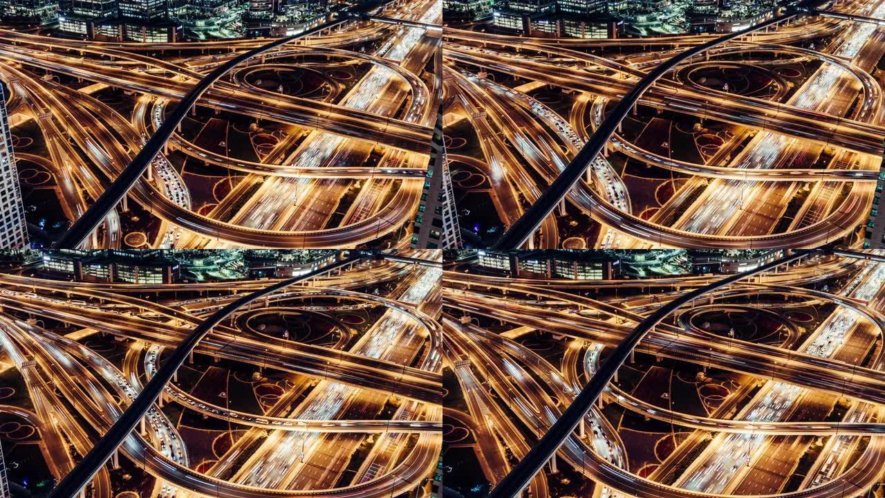 阿联酋迪拜夜间立交桥、地铁和城市交通的T/L ZI鸟瞰图