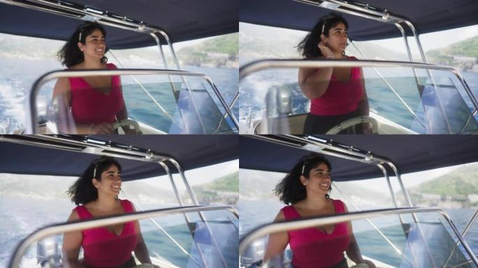 女人在意大利海岸驾驶船只
