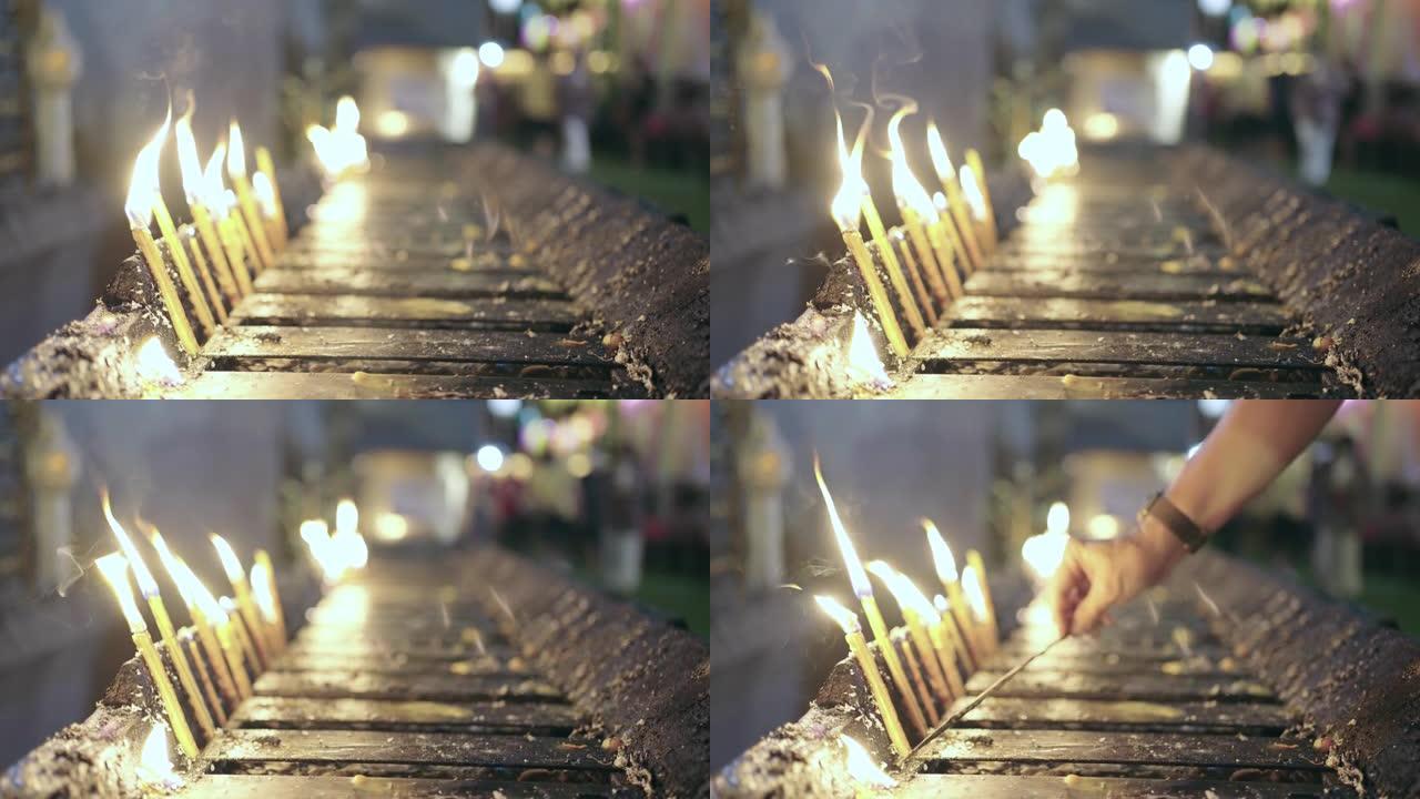 佛教特殊日子泰国寺庙的蜡烛