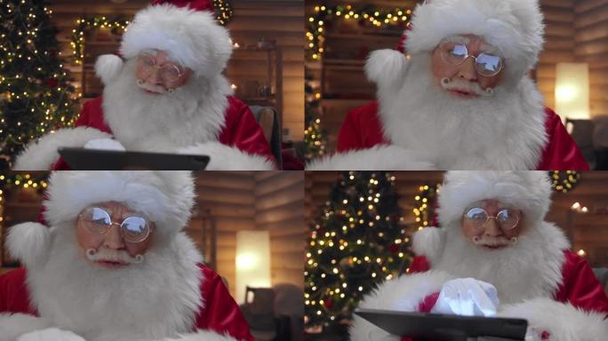 快乐的圣诞老人在平板电脑上的网上商店找到了他需要的东西