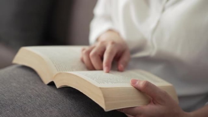 Woman reading book, Close-up