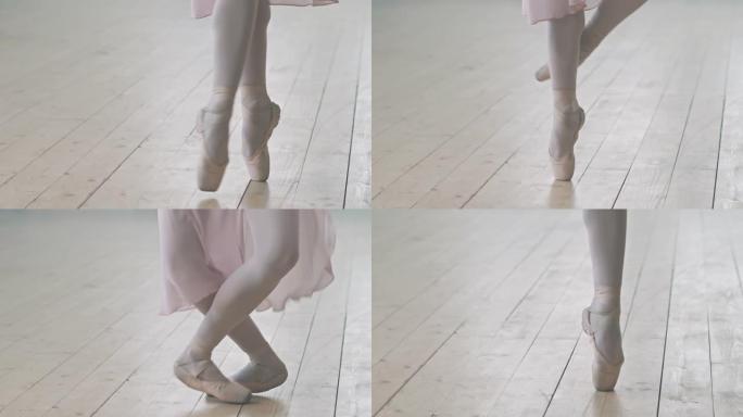 芭蕾舞演员的腿在木地板上跳舞