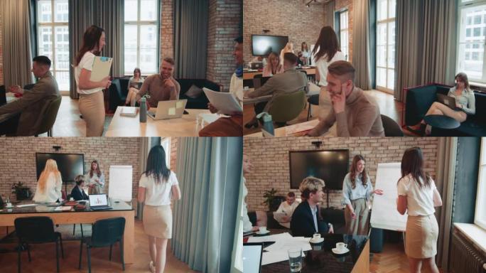 摄像机跟随年轻快乐的执行董事，女商人经理进入办公室会议，与同事聊天。