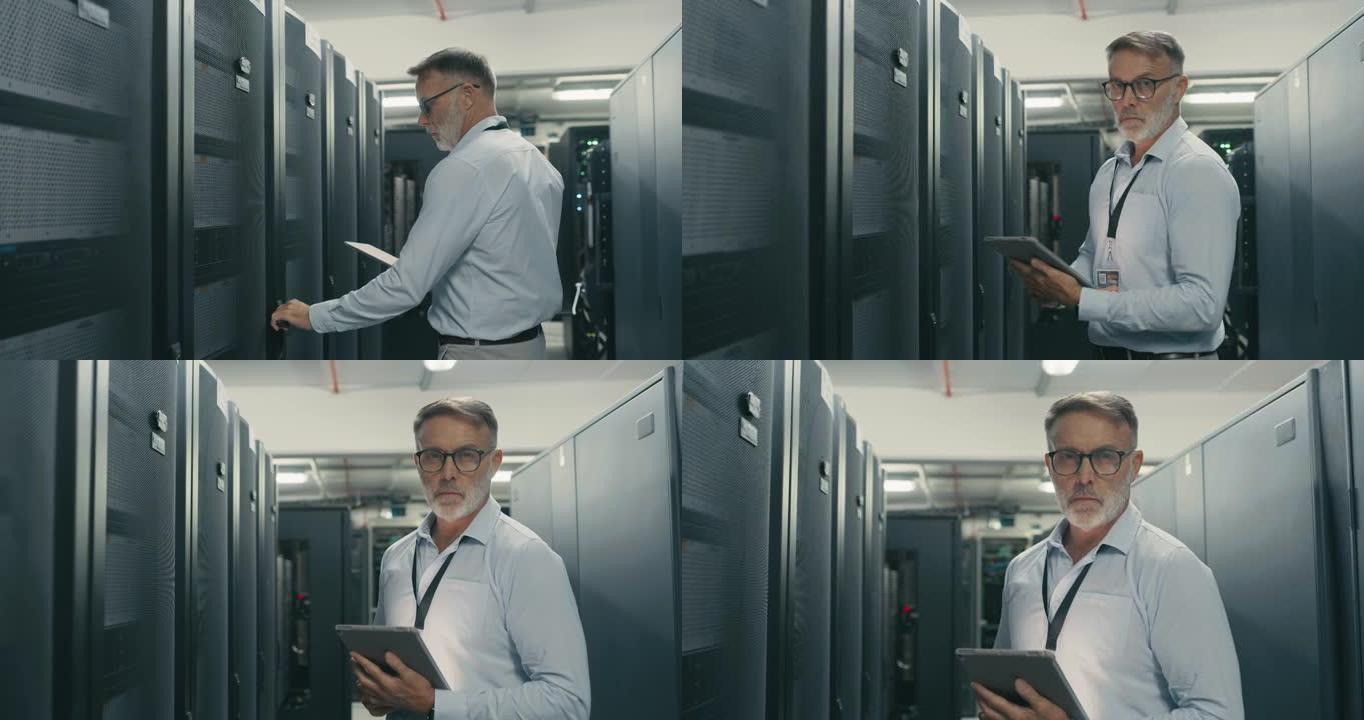 在服务器机房进行维护检查时，使用数字平板电脑的成熟技术人员的4k视频片段