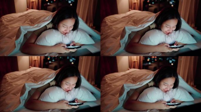 昏昏欲睡的女人在午夜在床上玩社交媒体。