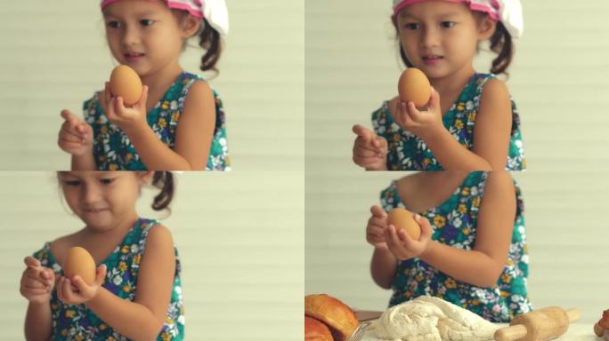 显示成分的小女孩小女孩和面面包蛋糕
