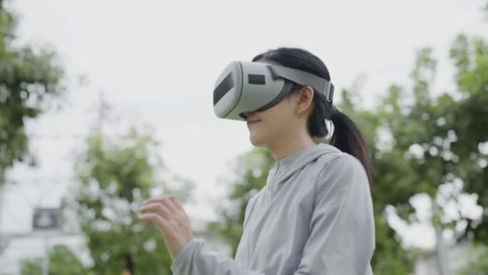 在Metaverse中进行虚拟电子竞技训练的亚洲女性
