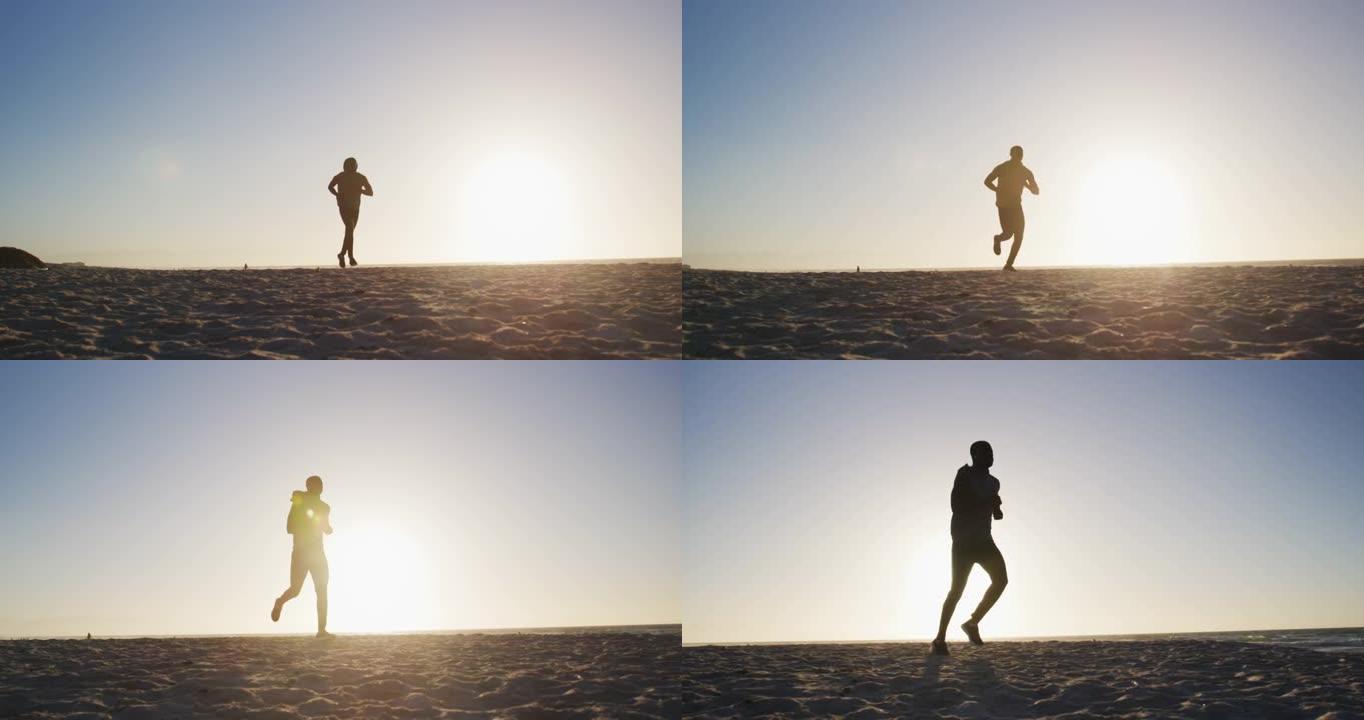 非裔美国男子在海滩上跑步，晚上在海滩上户外锻炼