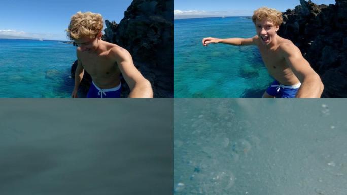 POV年轻快乐男子悬崖从极端壁架跳进热带蓝色海洋
