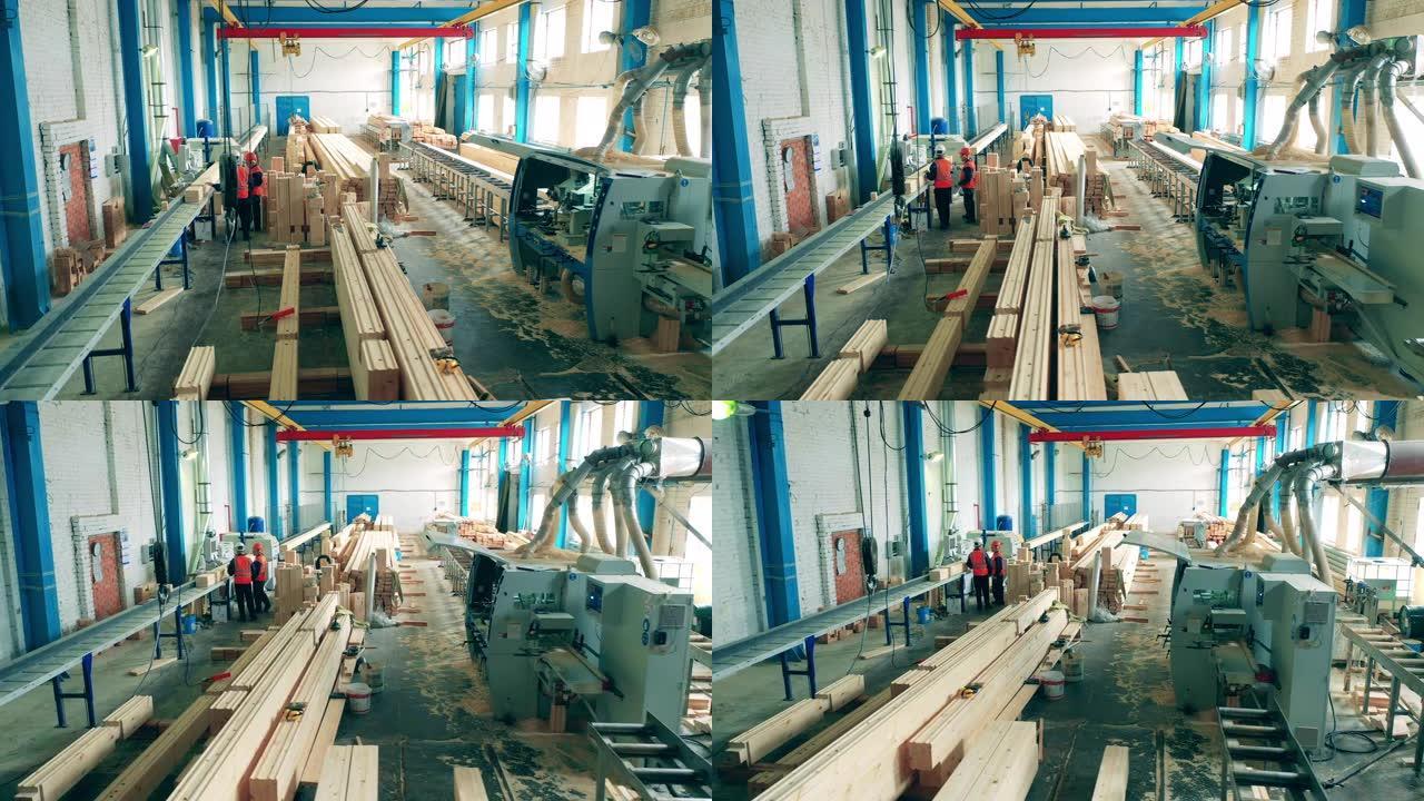 木匠在木工厂用机器工作。