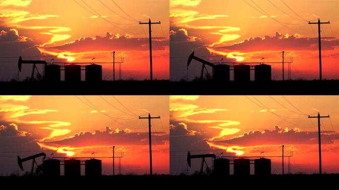 剪影: 在德克萨斯州的一个田地里，一个泵千斤顶提取原油的风景照片。