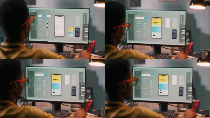 黑人男性在计算机上创建手机应用程序