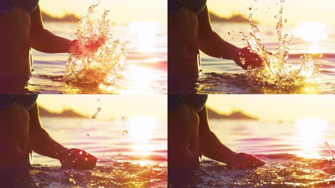 镜头耀斑: 适合女性的游客在暑假期间溅海水。