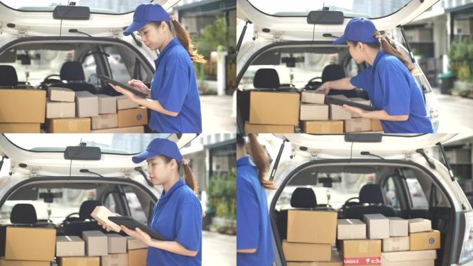 送货人员携带纸质包装箱送货给女顾客