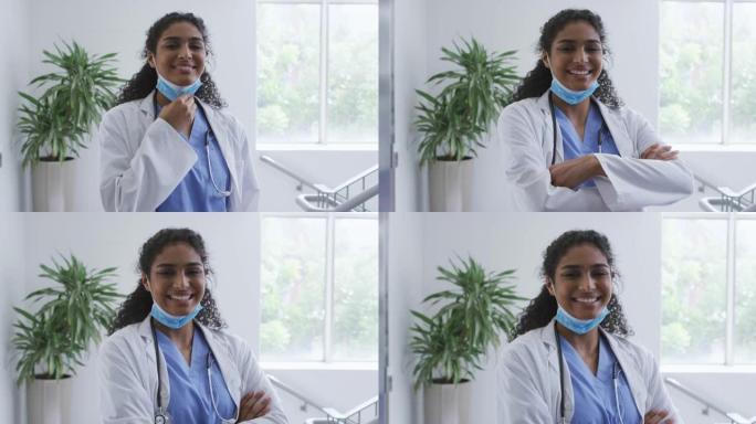 亚洲女医生在医院放下口罩微笑的肖像